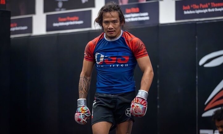 Mark Climaco mean mugging during a hard day of training