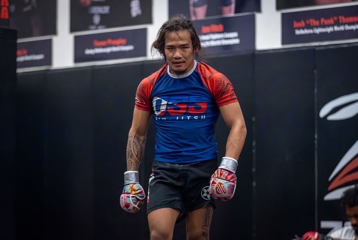 Mark Climaco mean mugging during a hard day of training