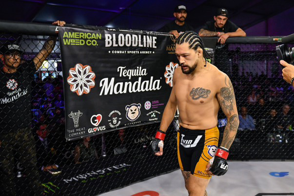 Richie Miranda paces in the cage before his fight